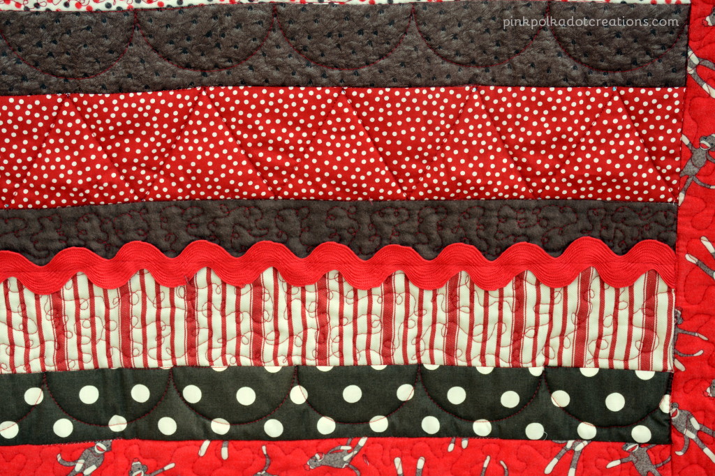 sock monkey strip quilt-close up